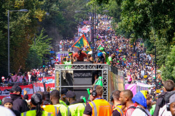 London, UK, 25th August, 2024. Huge crowds following parade floats were seen in Ladbroke Grove as the the first day of the Notting Hill Carnival, known as Family Day ot Children’s Day got underway today. Credit: Eleventh Hour Photography/Alamy Live News